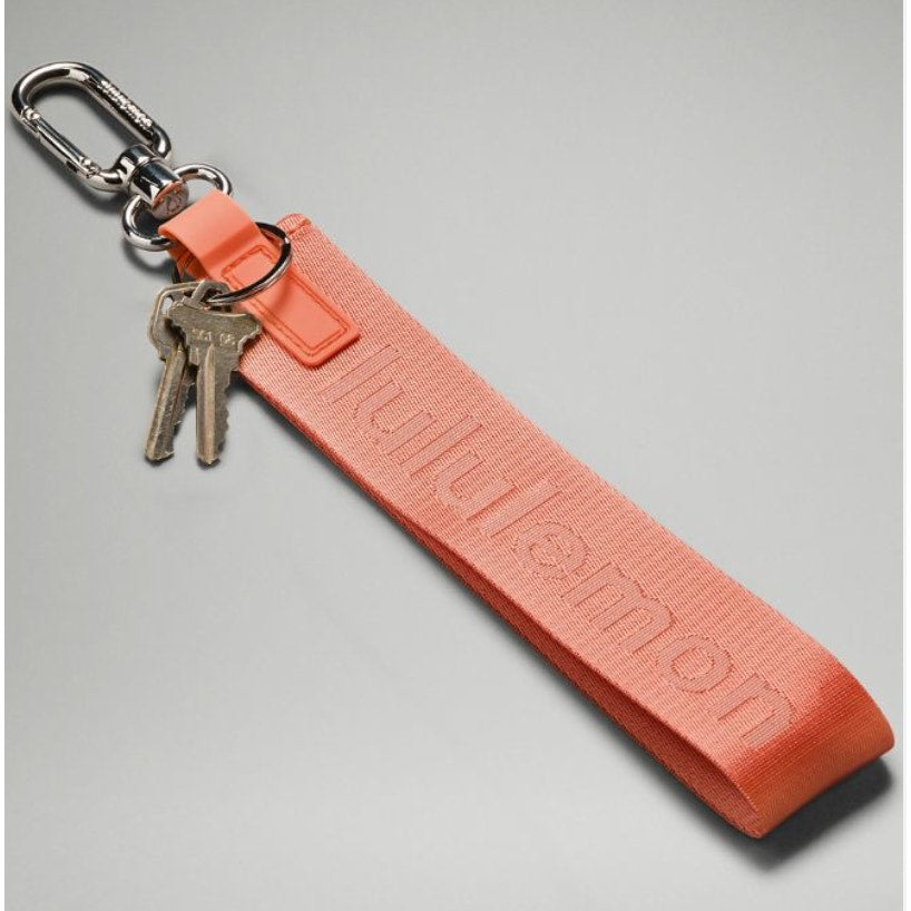 6552 NWT Lululemon Never Lost Keychain- CORAL KISS *SOLD OUT