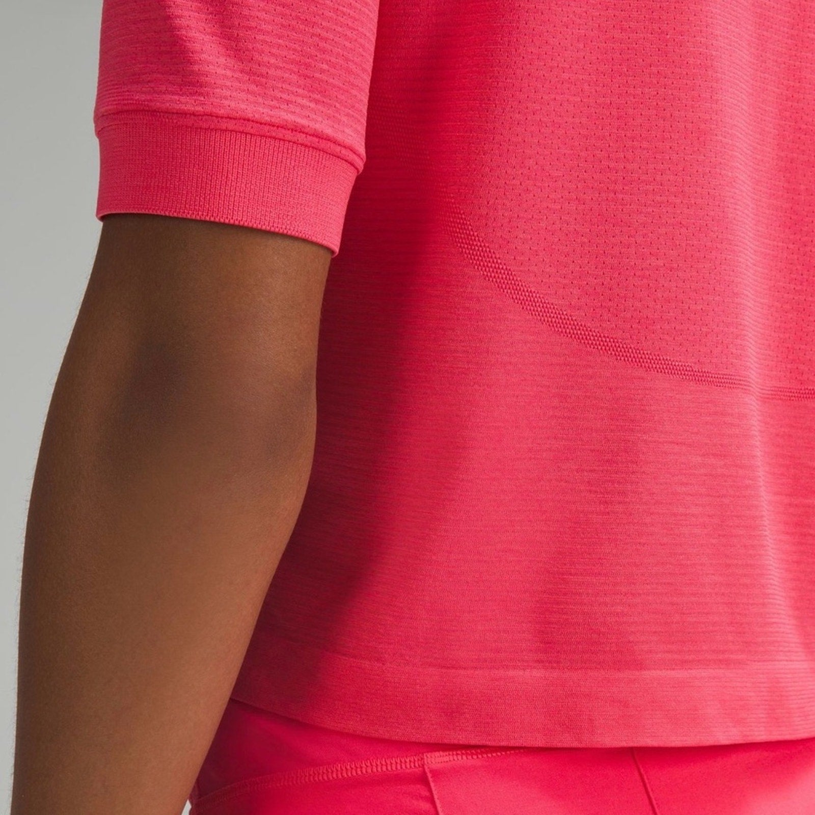 (6569/6570) NWT Swiftly Tech Relaxed-Fit Polo Shirt in LIPGLOSS