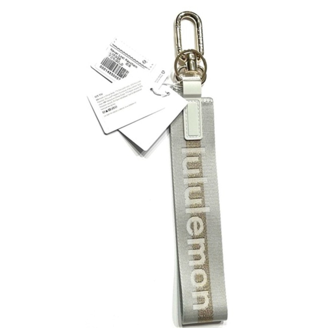 6493/6494 NWT Lululemon Never Lost Keychain- VAPOR GOLD *SOLD OUT