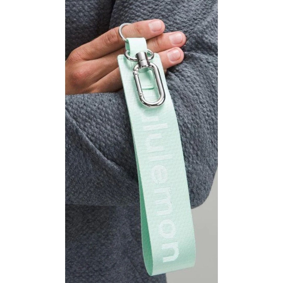 6554 NWT Lululemon Never Lost Keychain- IDEAL MINT/WHT *SOLD OUT