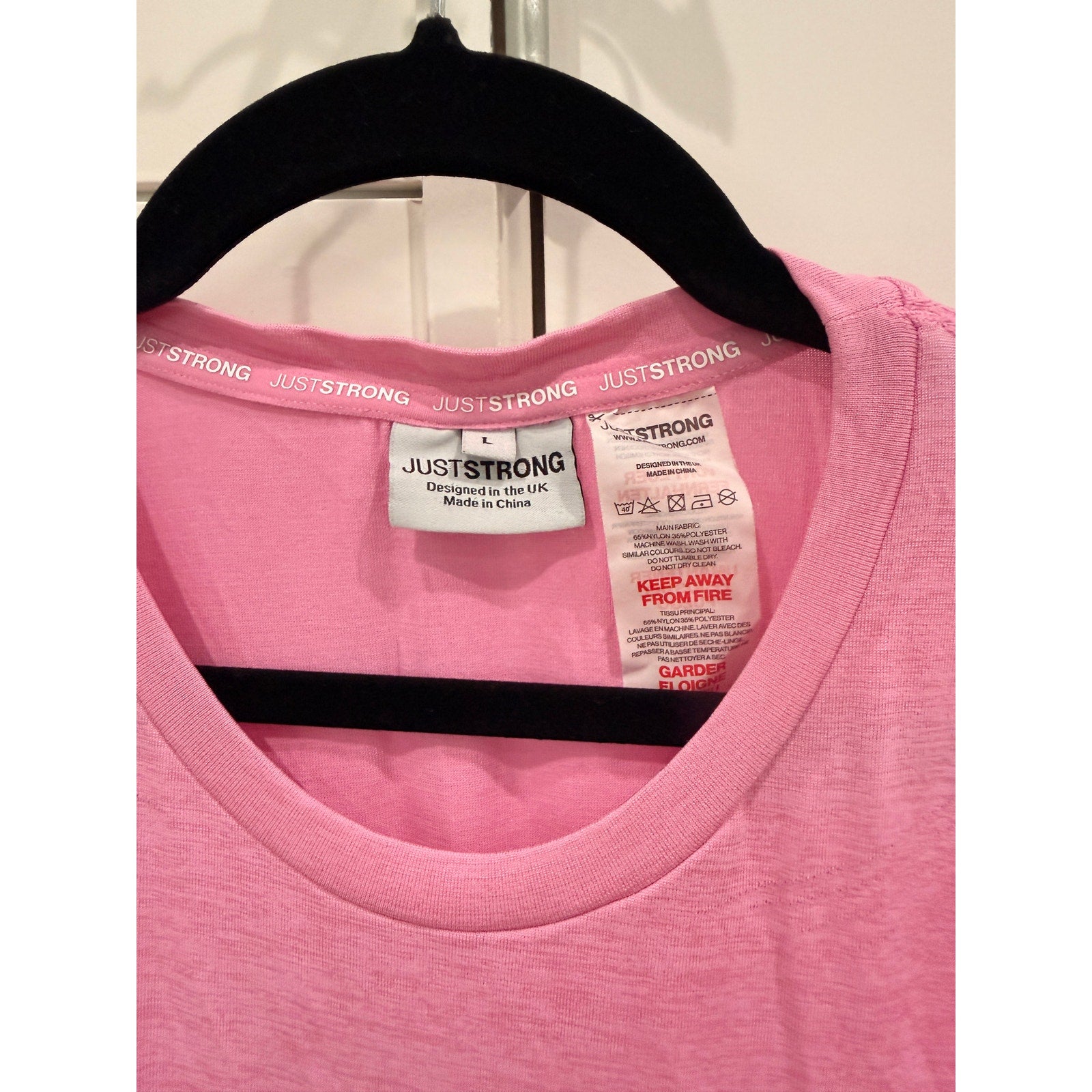 366- JUST STRONG Laser Seamless Workout Tee in Bubblegum in Sz L