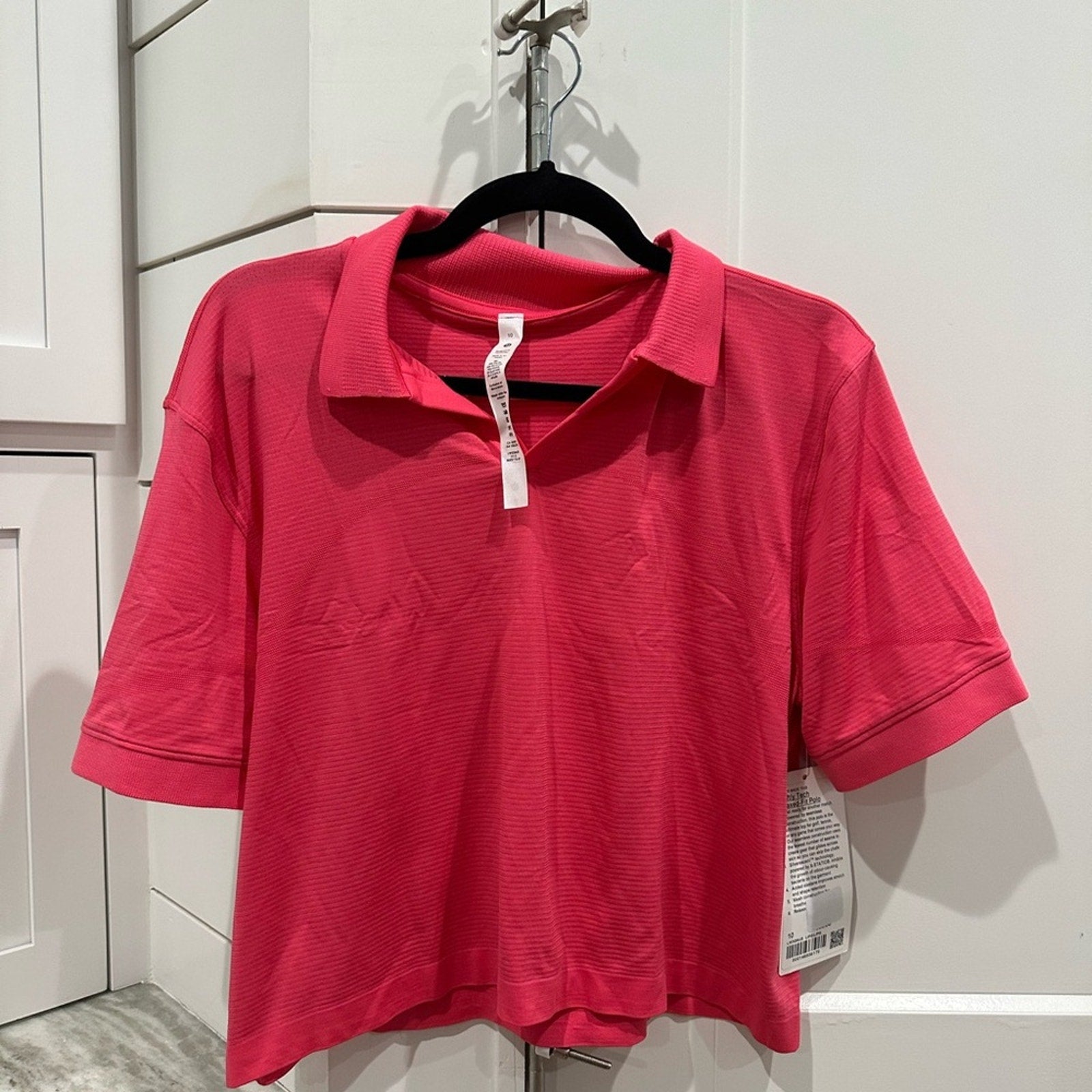6567 NWT Swiftly Tech Relaxed-Fit Polo Shirt in LIPGLOSS Sz 8