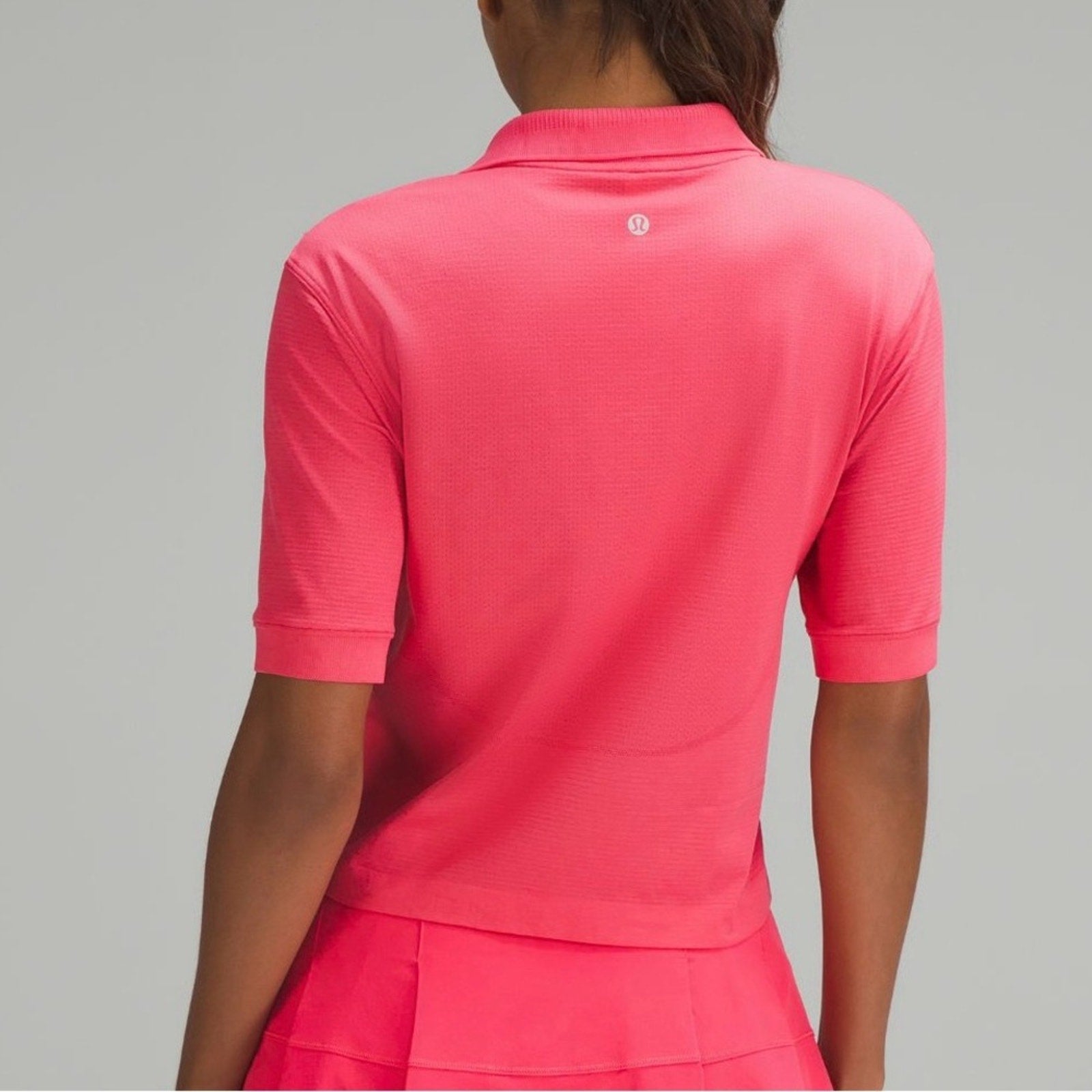 (6569/6570) NWT Swiftly Tech Relaxed-Fit Polo Shirt in LIPGLOSS