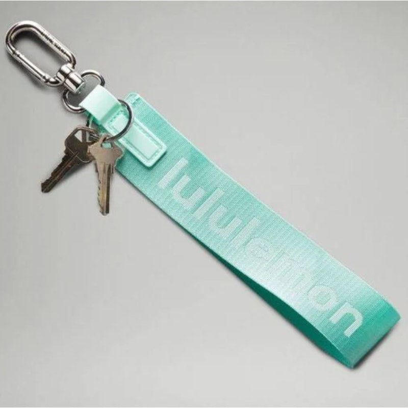 6554 NWT Lululemon Never Lost Keychain- IDEAL MINT/WHT *SOLD OUT