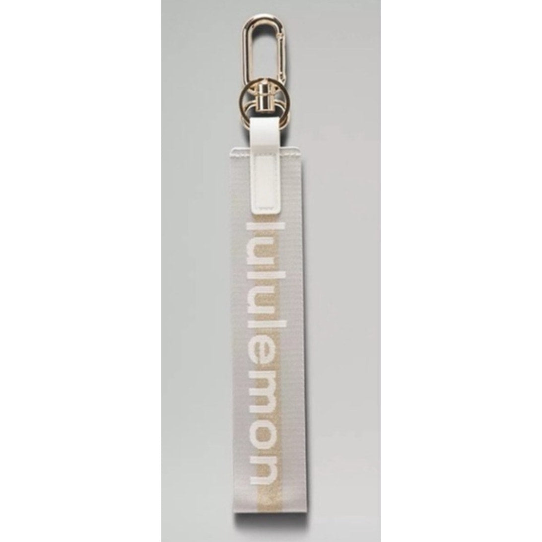 6493/6494 NWT Lululemon Never Lost Keychain- VAPOR GOLD *SOLD OUT