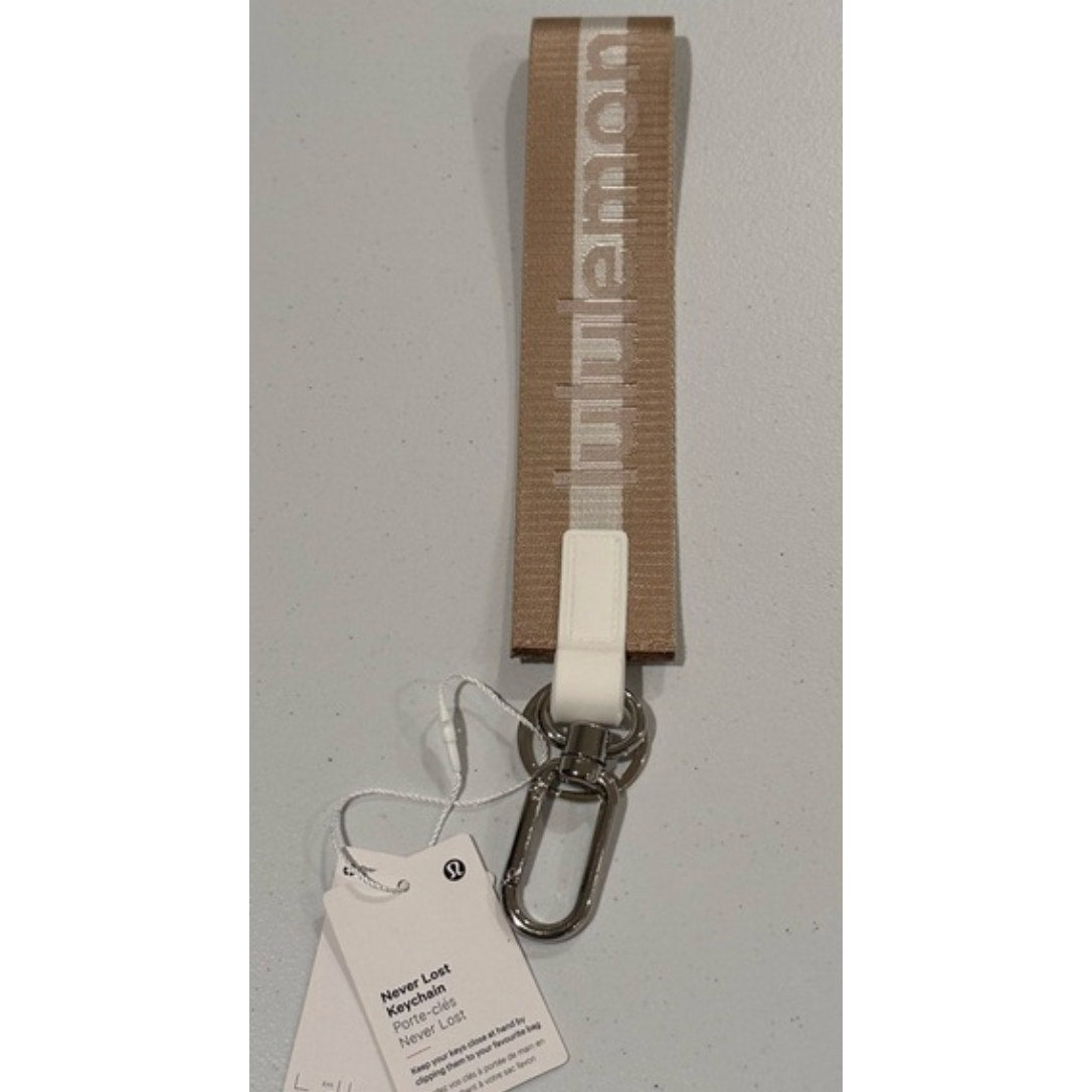 0269  NWT Lululemon Never Lost Keychain- Raw Linen/White Opal/White