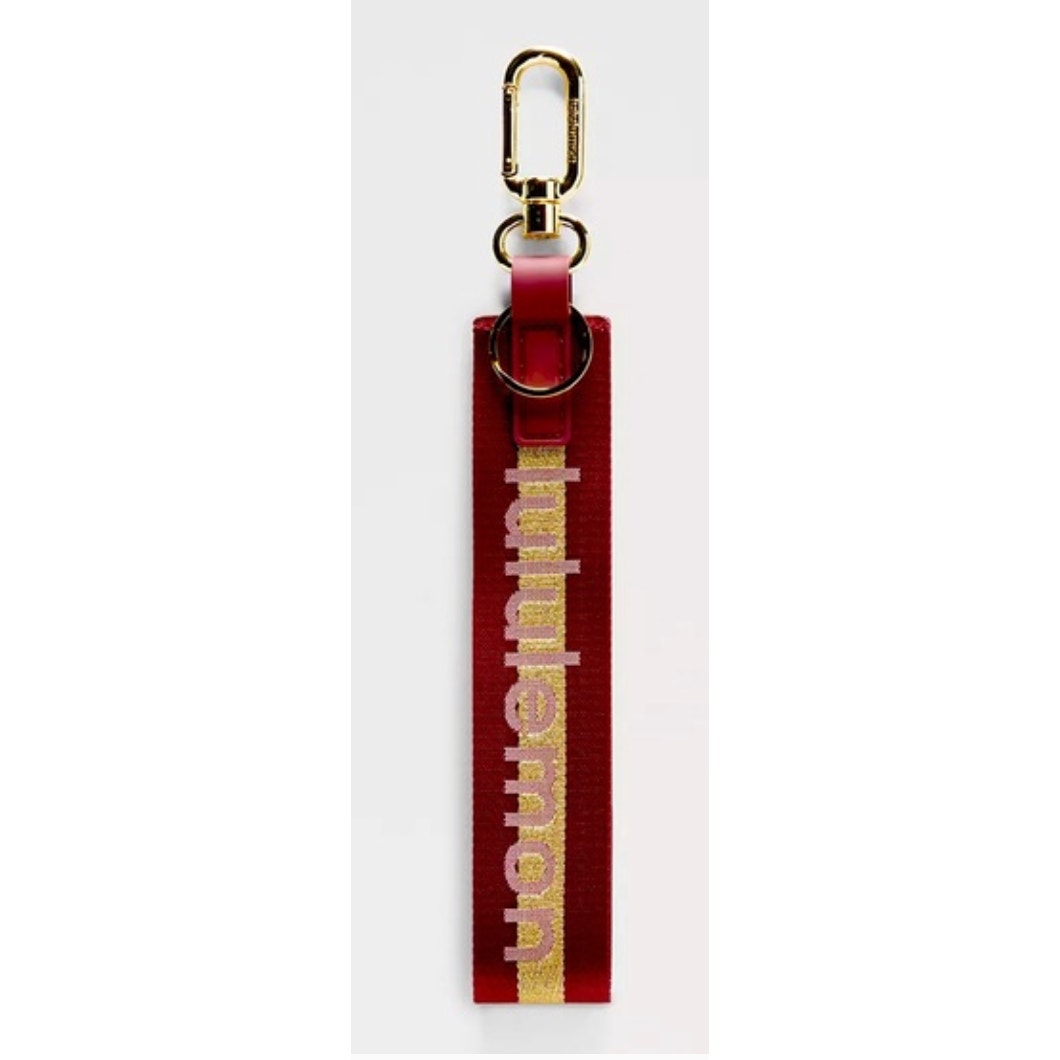 6492  NWT Lululemon Never Lost Keychain- DELUXE/GOLD *SPARKLES