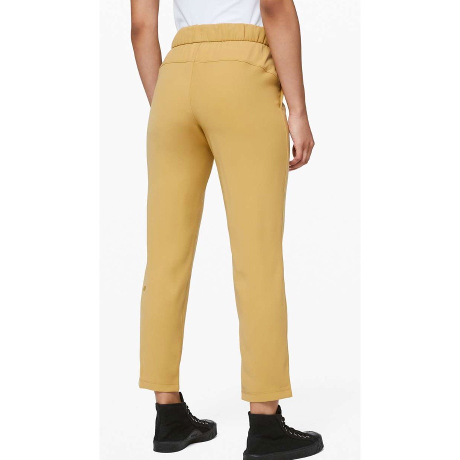 6605 LULULEMON On the Fly 7/8 Pant *Woven Vintage Gold sz 4 *LOVED