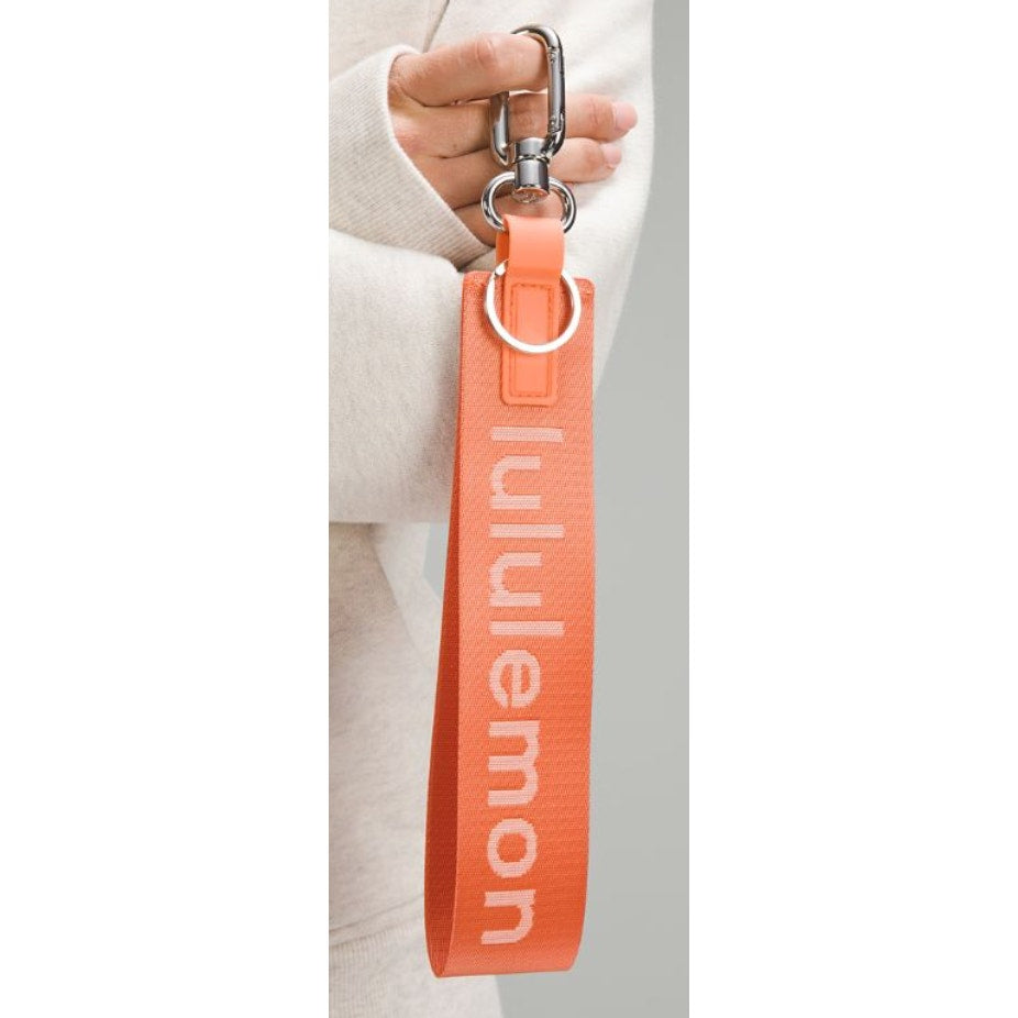 6552 NWT Lululemon Never Lost Keychain- CORAL KISS *SOLD OUT