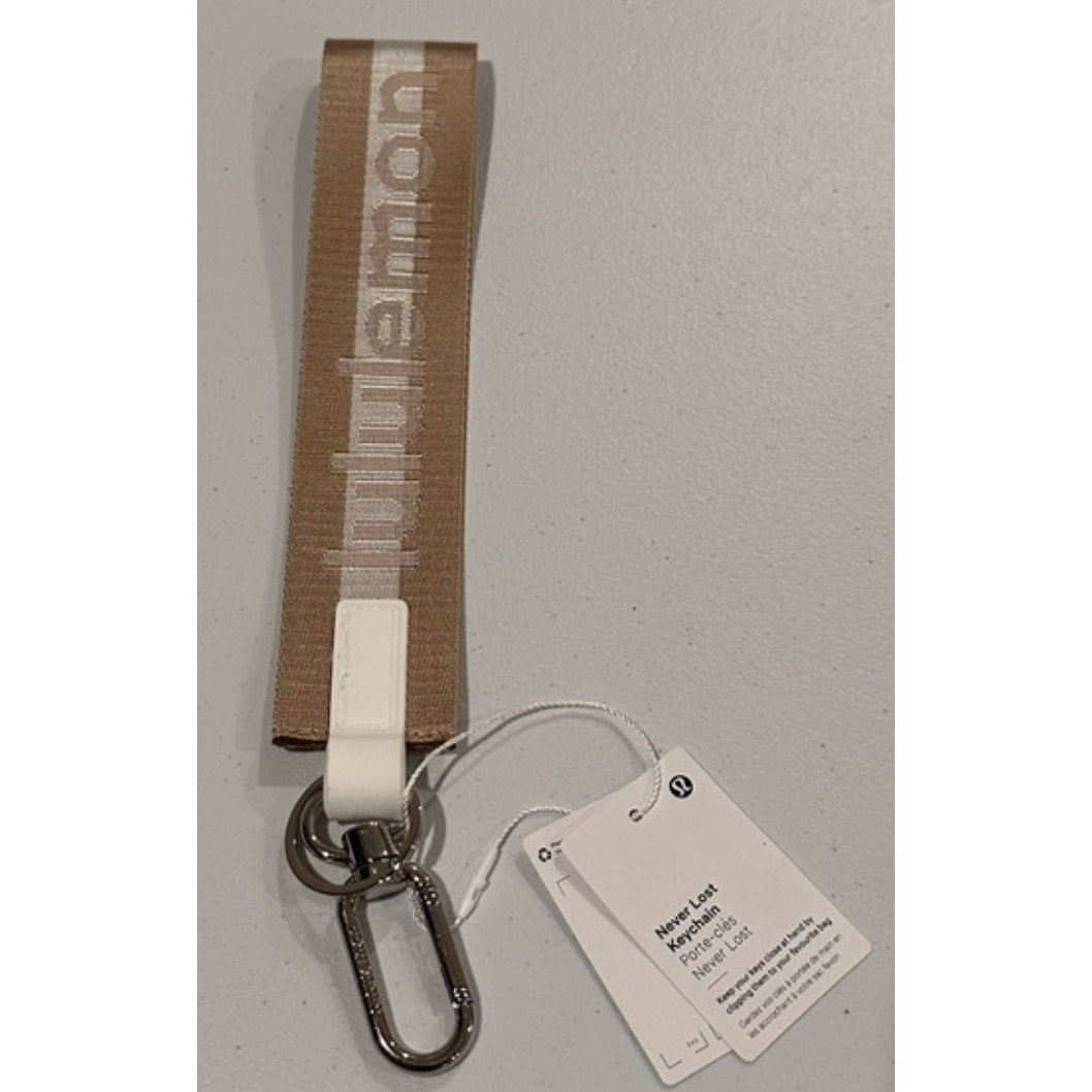0269  NWT Lululemon Never Lost Keychain- Raw Linen/White Opal/White