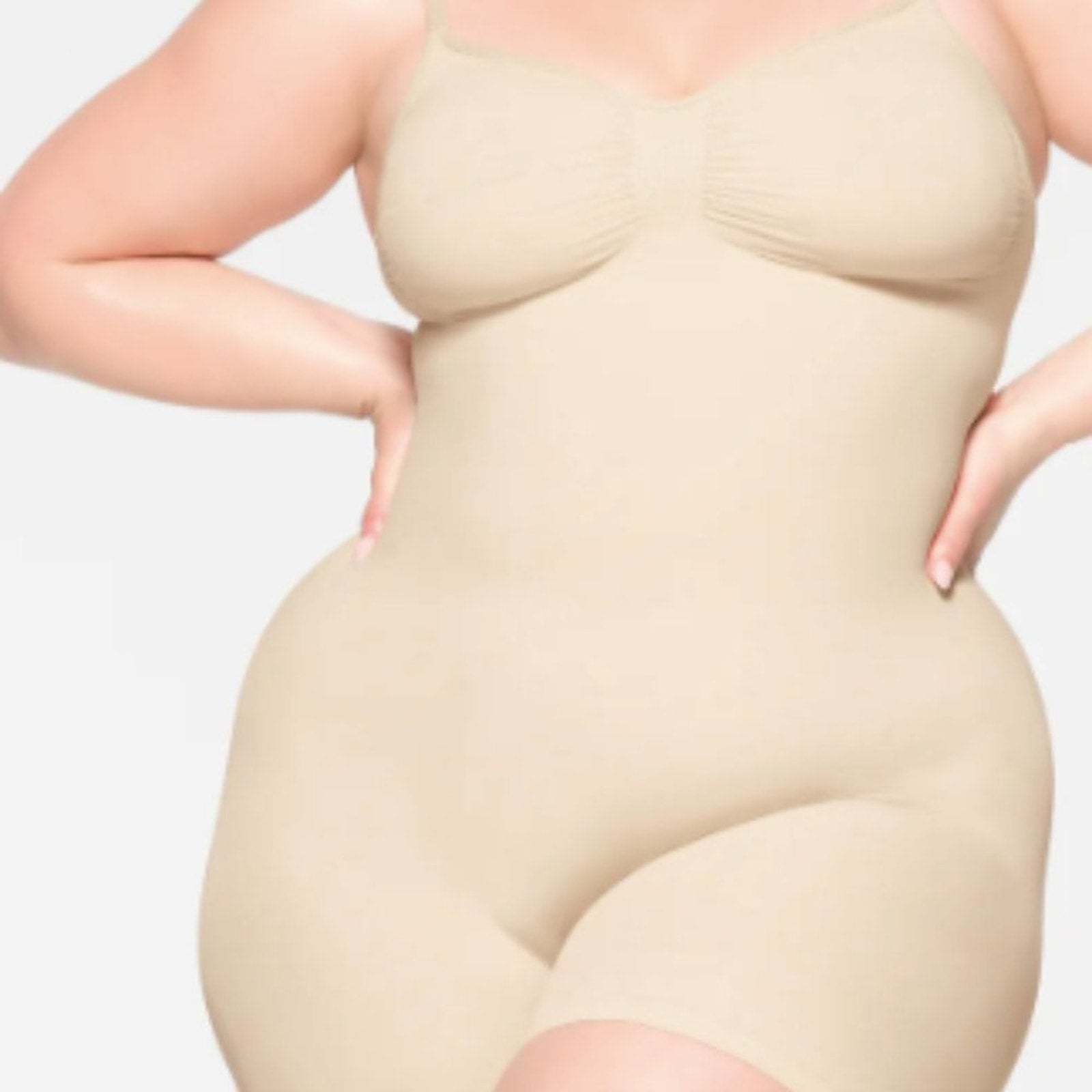 (1208/1211) SEAMLESS SCULTP MID THIGH BODYSUIT - SAND in SMALL
