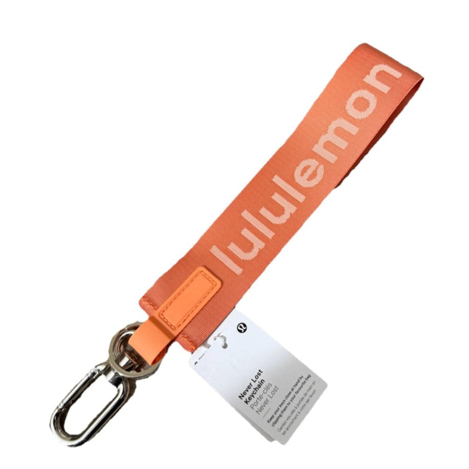 6552 NWT Lululemon Never Lost Keychain- CORAL KISS *SOLD OUT