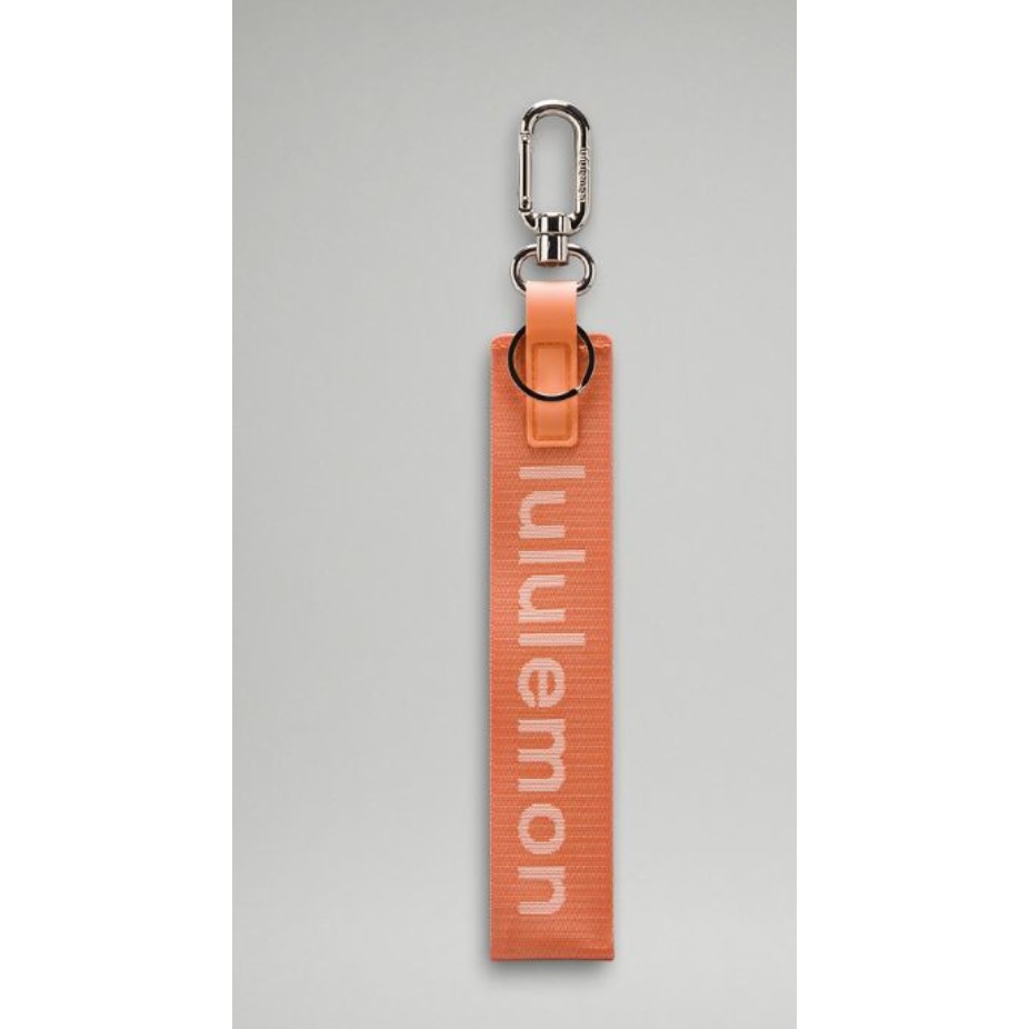 6552 NWT Lululemon Never Lost Keychain- CORAL KISS *SOLD OUT