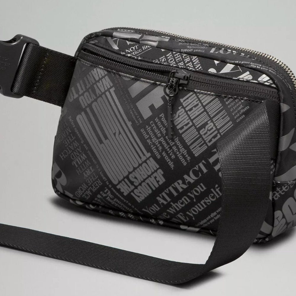 (2303/2304) NWT LLL Everywhere Belt Bag 1L Manifesto Print *** ANNIV EDITION