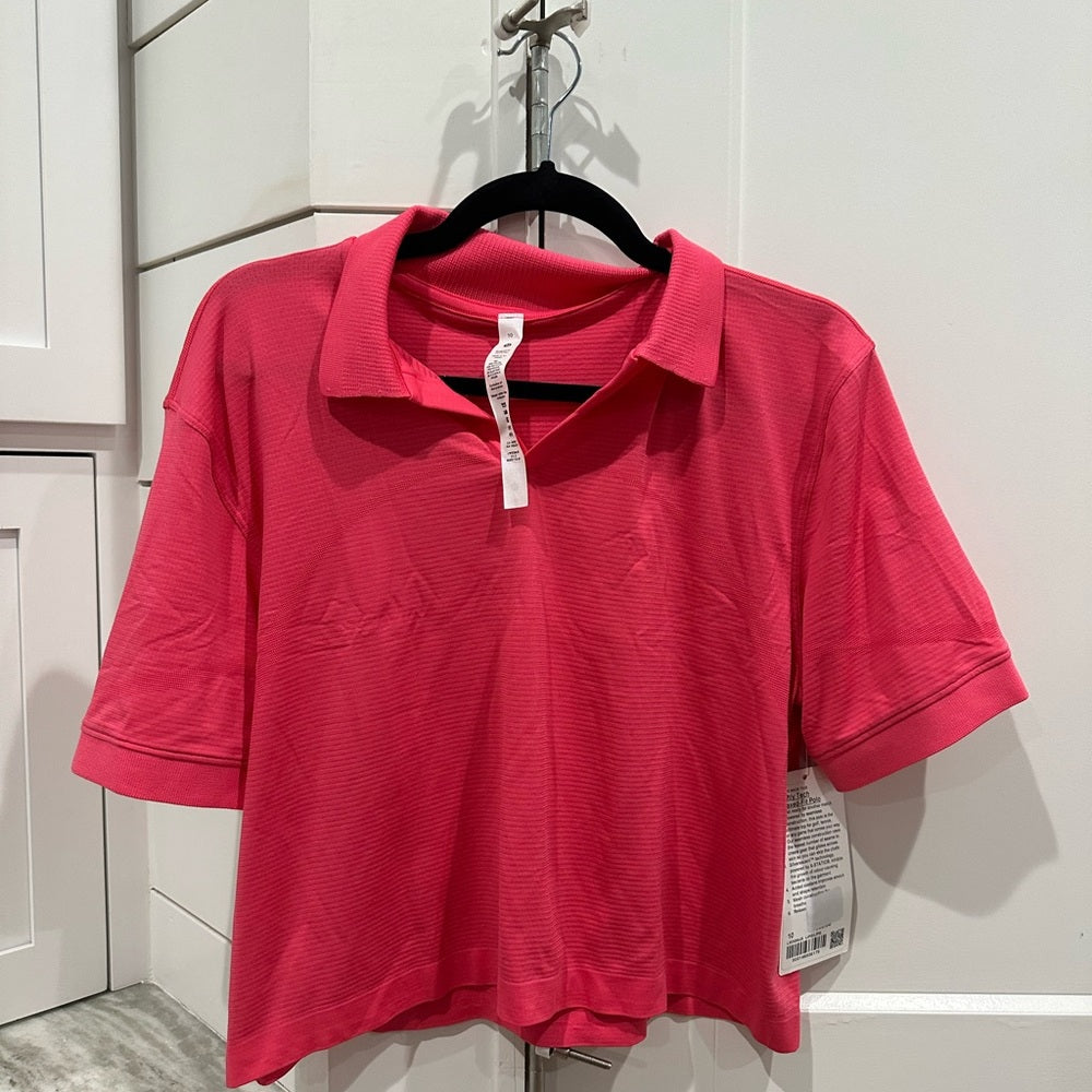 (1980/84) NWT Swiftly Tech Relaxed-Fit Polo Shirt in LIPGLOSS